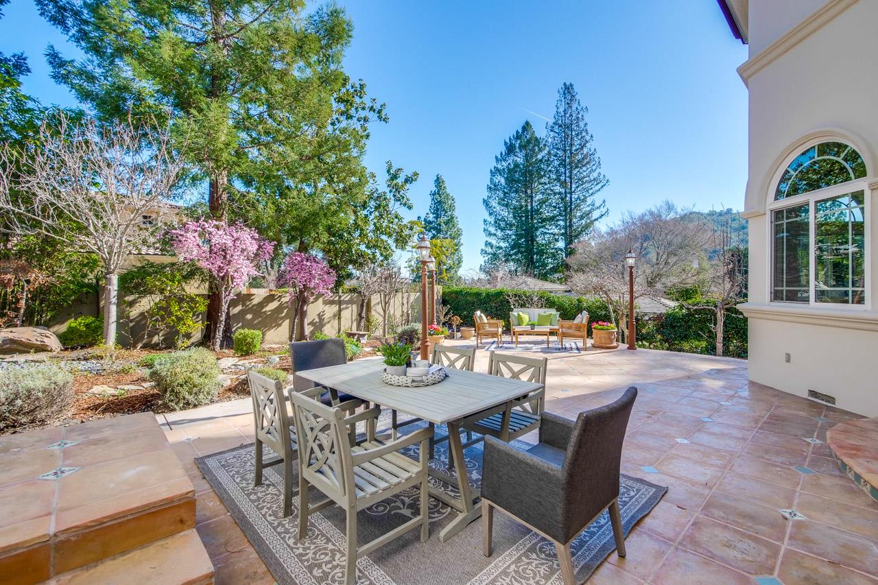 10935 Miramonte Road Cupertino, CA 95014 - Photo 63 of 71 a view of a patio with a table and chairs