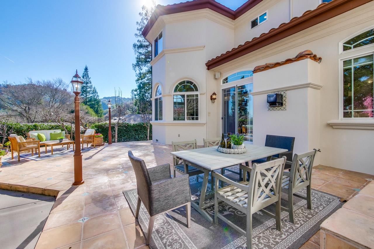10935 Miramonte Road Cupertino, CA 95014 - Photo 65 of 71 a view of a dinning table and chairs in the patio