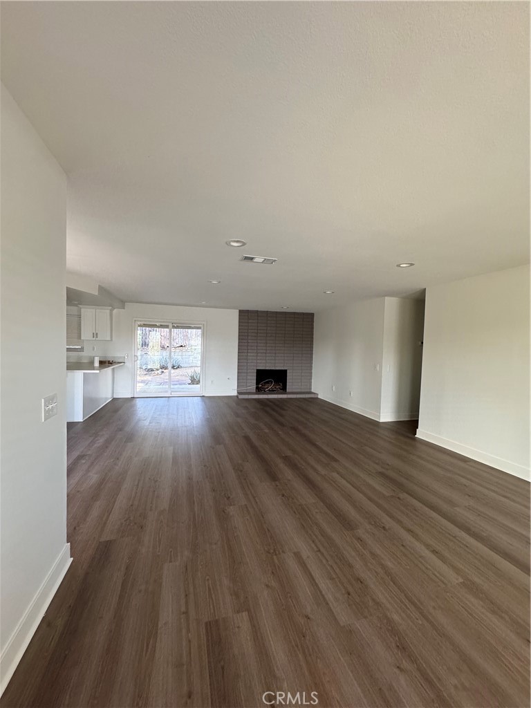 15521 Saddleback Road Riverside, CA 92506 - Photo 2 of 8 a view of empty room with wooden floor
