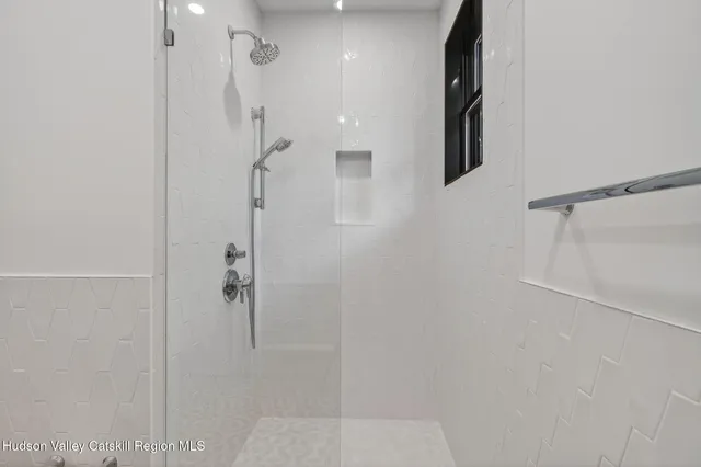 a view of a hallway with a large window