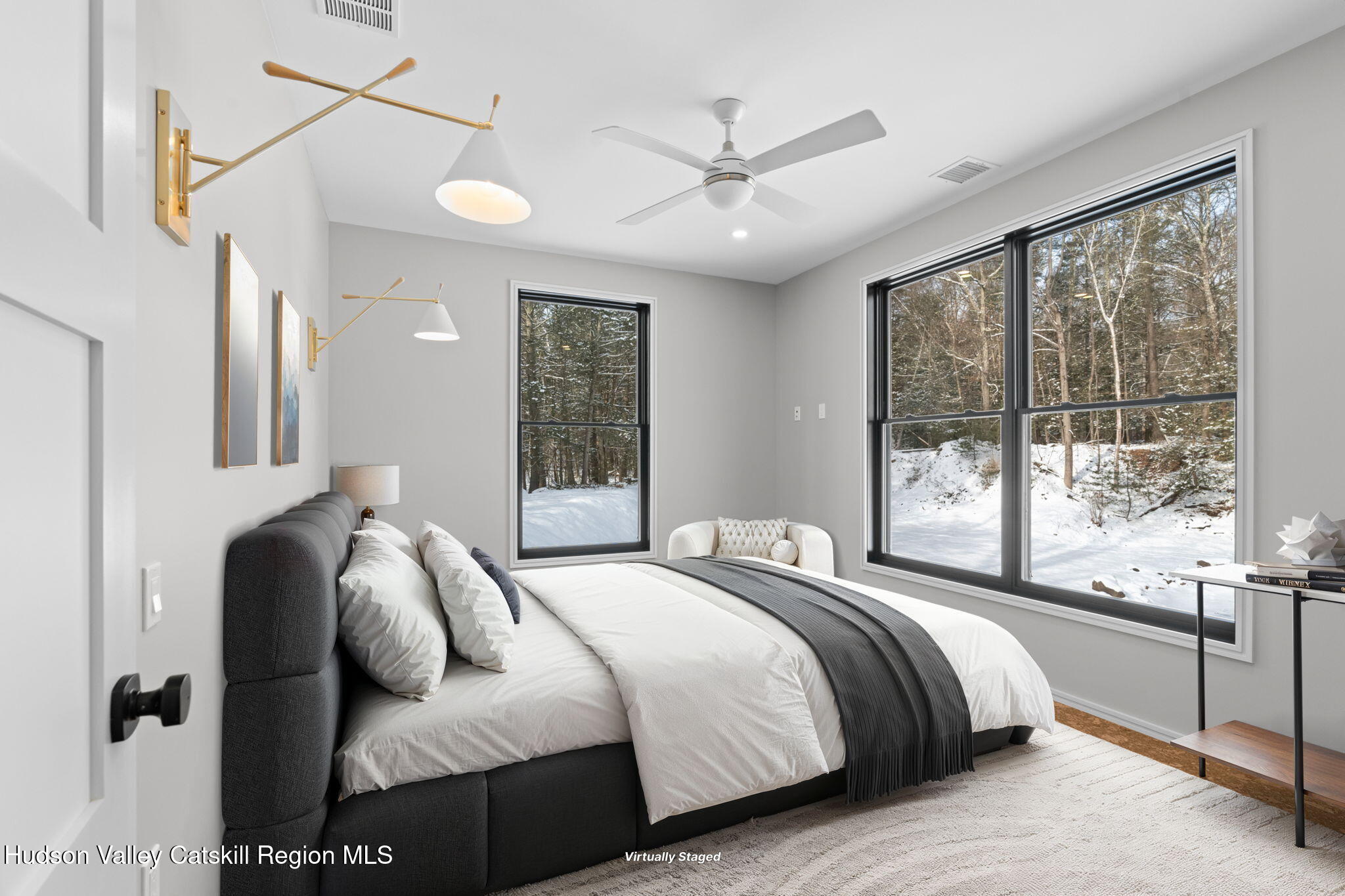 178 Chestnut Hill Road Woodstock, NY 12498 - Photo 32 of 42 a bedroom with a large bed and a large window