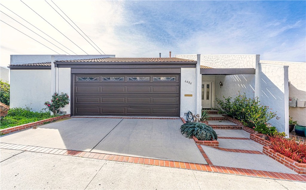 6486 Caminito Estrellado San Diego, CA 92120 - Photo 1 of 51 a view of entryway with small garden