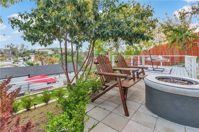 a bed room with a bed and a chair