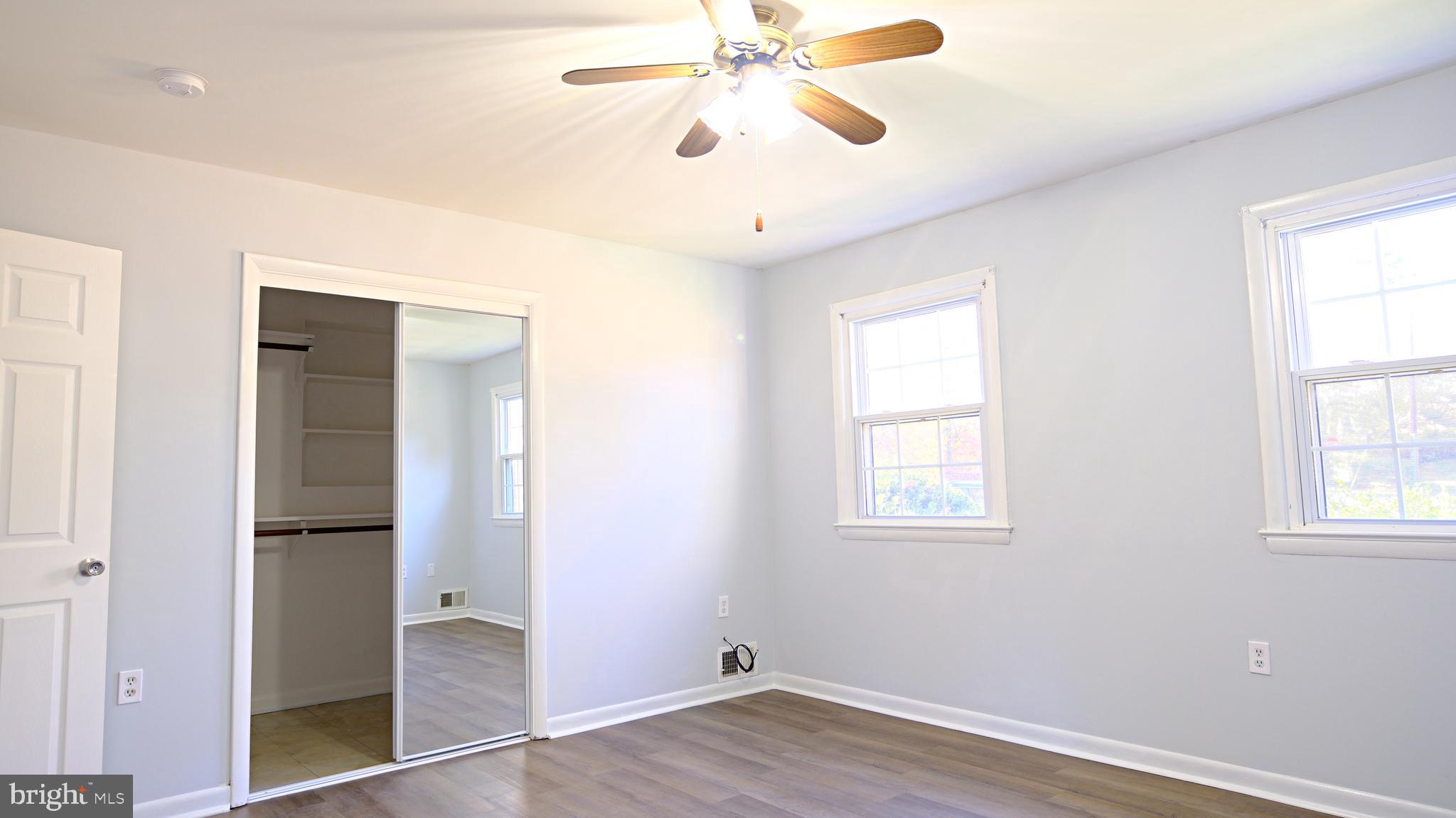 1950 Aberdeen Drive Dunkirk, MD 20754 - Photo 17 of 21 wooden floor in an empty room with a window