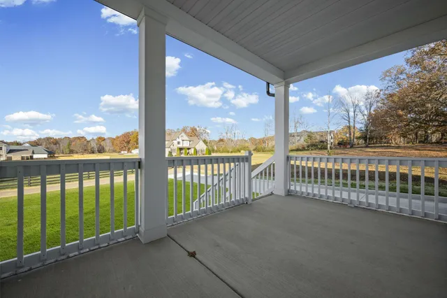 a view of a street from a balcony