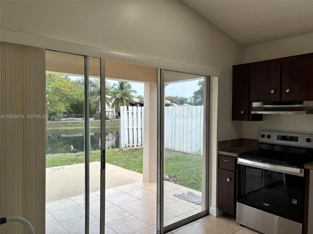 a kitchen with a large window