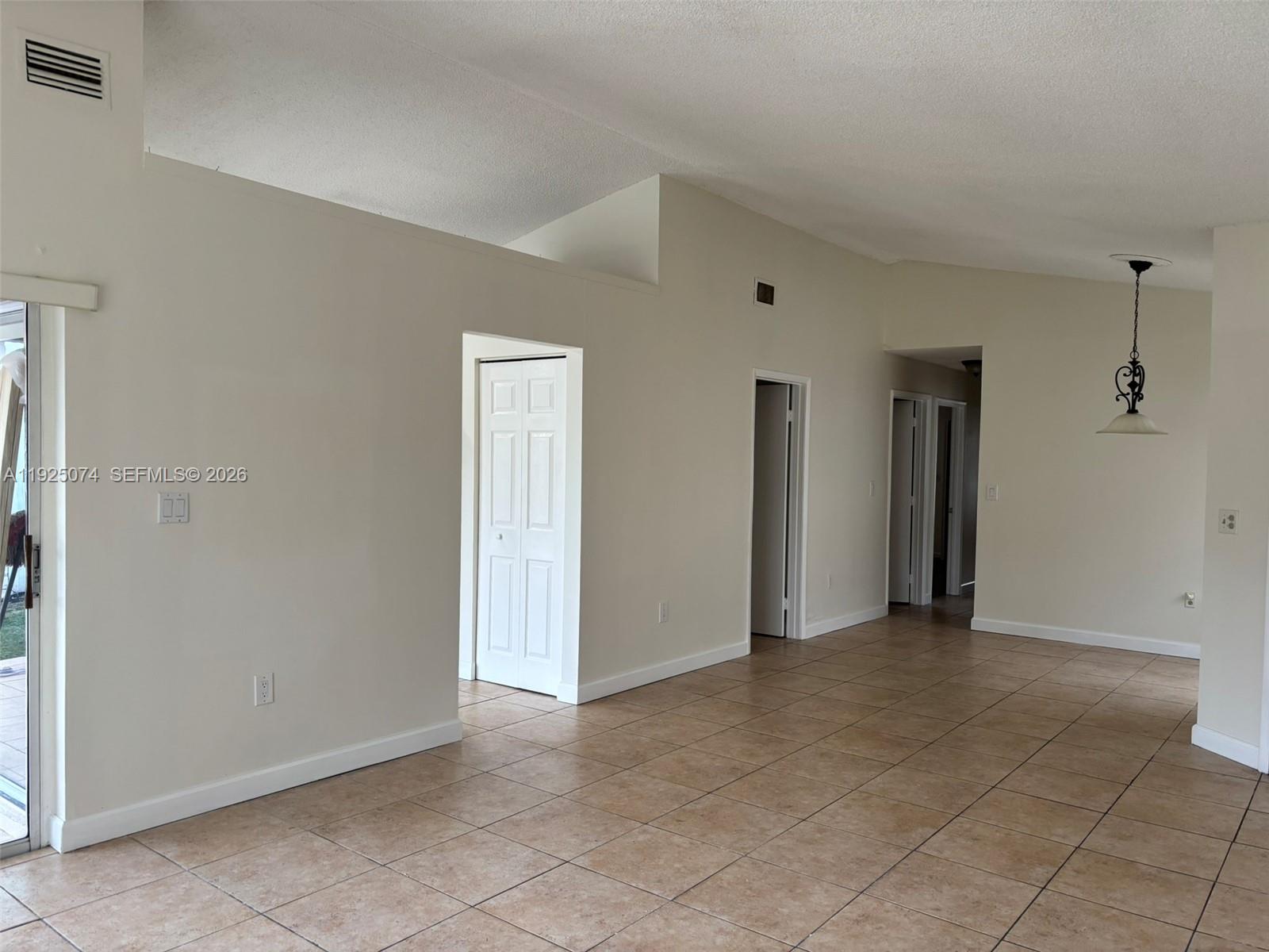 7331 Southwest 149th Court Miami, FL 33193 - Photo 10 of 25 a view of an empty room