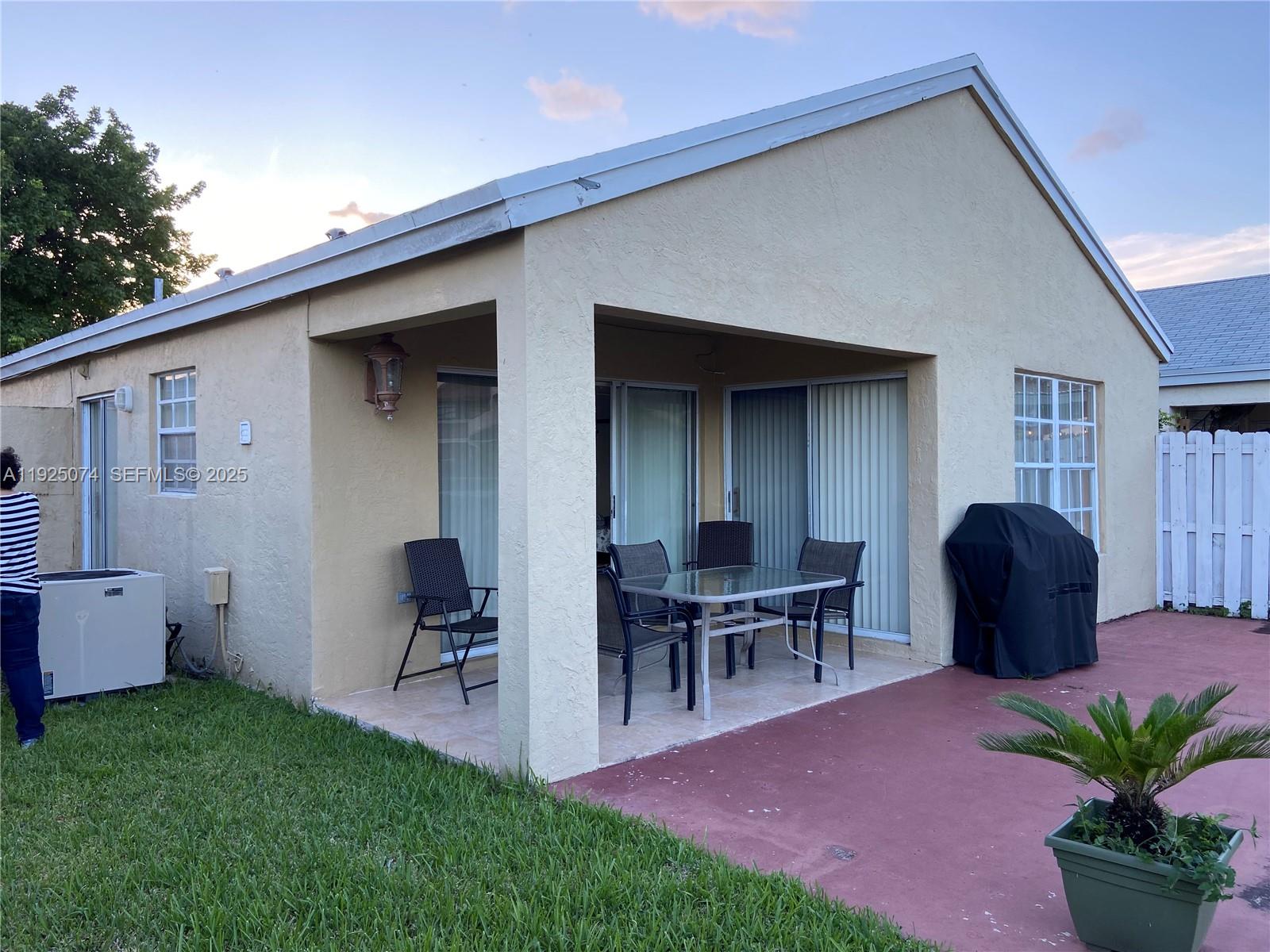 7331 Southwest 149th Court Miami, FL 33193 - Photo 10 of 10 a view of outdoor space yard and patio