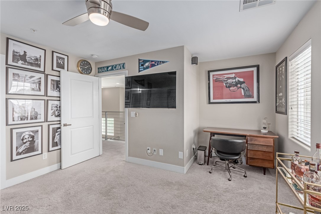3165 Via Como Henderson, NV 89044 - Photo 18 of 42 Carpeted office featuring a ceiling fan, healthy amount of natural light, and baseboards