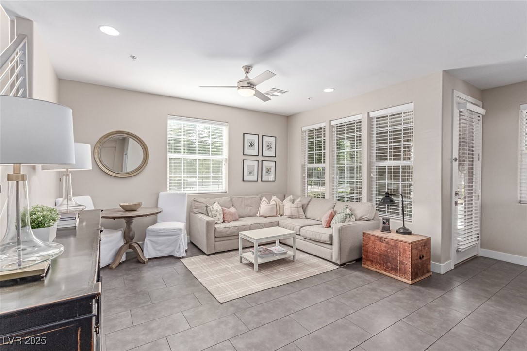 3165 Via Como Henderson, NV 89044 - Photo 31 of 42 Living room with ceiling fan, tile patterned flooring, recessed lighting, and baseboards