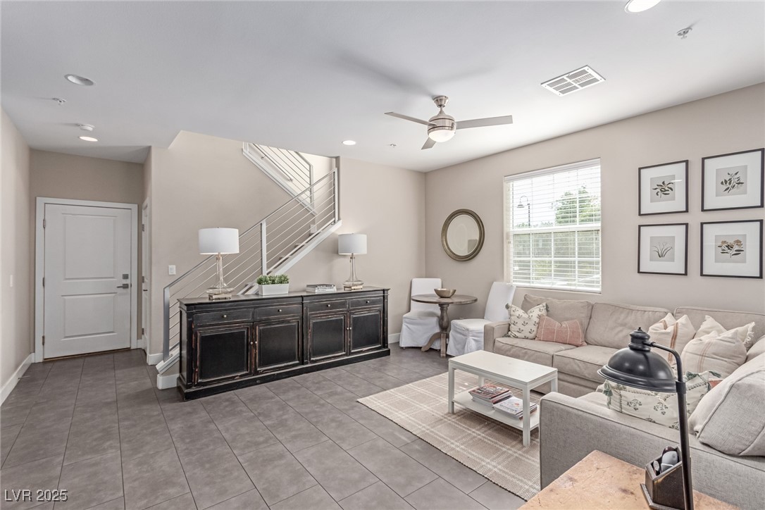 3165 Via Como Henderson, NV 89044 - Photo 32 of 42 Living area featuring stairs, recessed lighting, ceiling fan, and baseboards