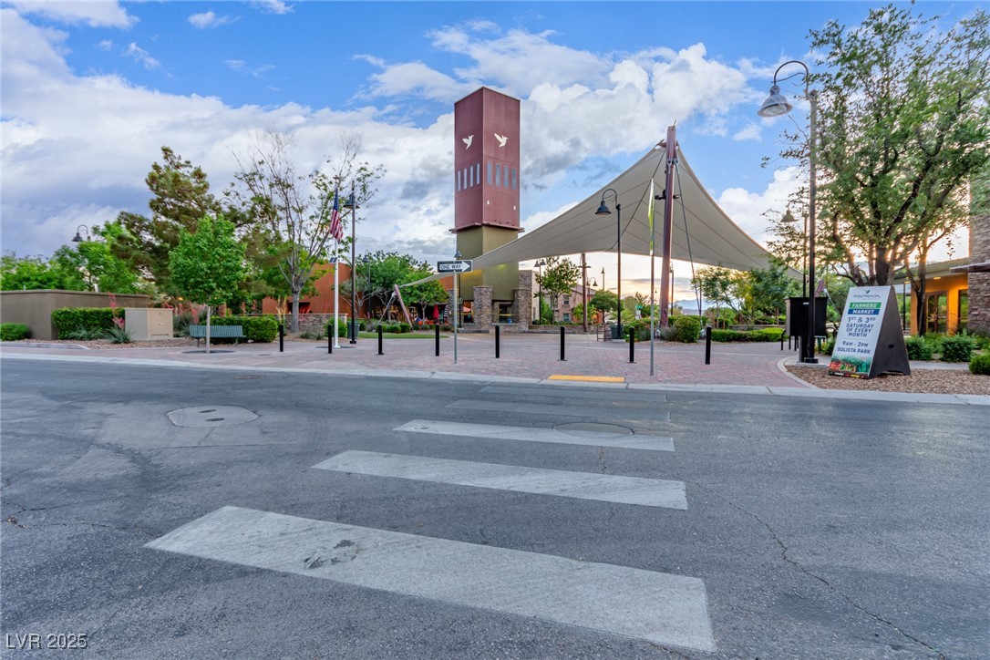 3165 Via Como Henderson, NV 89044 - Photo 39 of 42 View of asphalt road with street lighting, sidewalks, and curbs