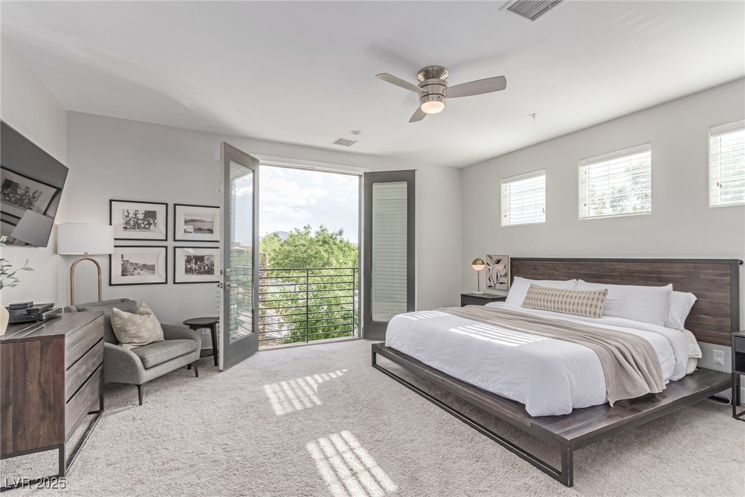 3165 Via Como Henderson, NV 89044 - Photo 10 of 42 Bedroom with carpet flooring, ceiling fan, and access to exterior