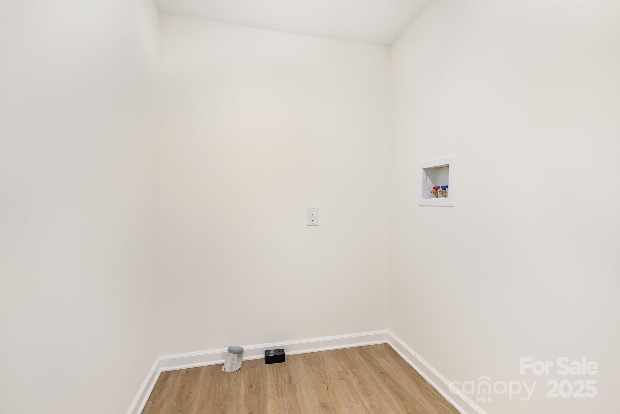 12180 A Coyle Road Stanfield, NC 28163 - Photo 14 of 16 a view of a small space with wooden floor