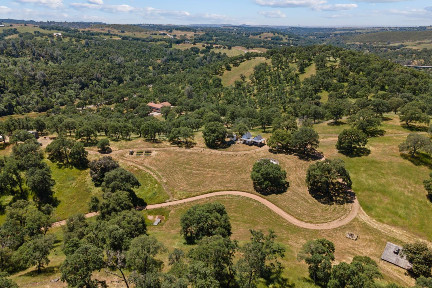 14883 Vaira Ranch Road Drytown, CA 95699 - Photo 50 of 60 an aerial view of residential house with outdoor space