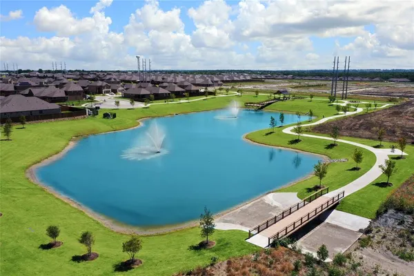 a view of a lake with a city