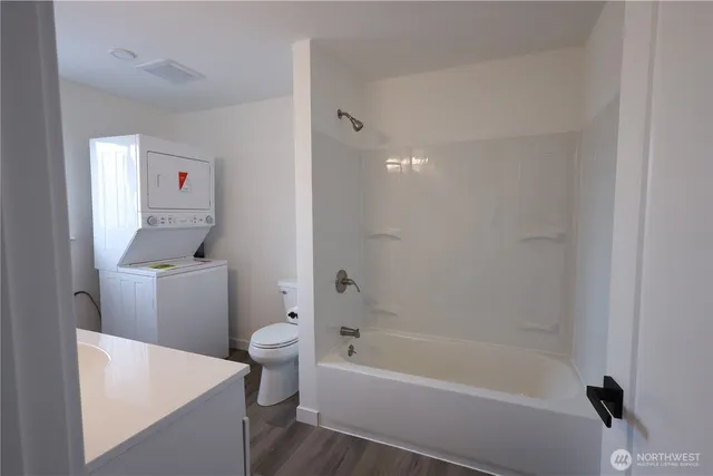 a bathroom with a sink a toilet and a bathtub