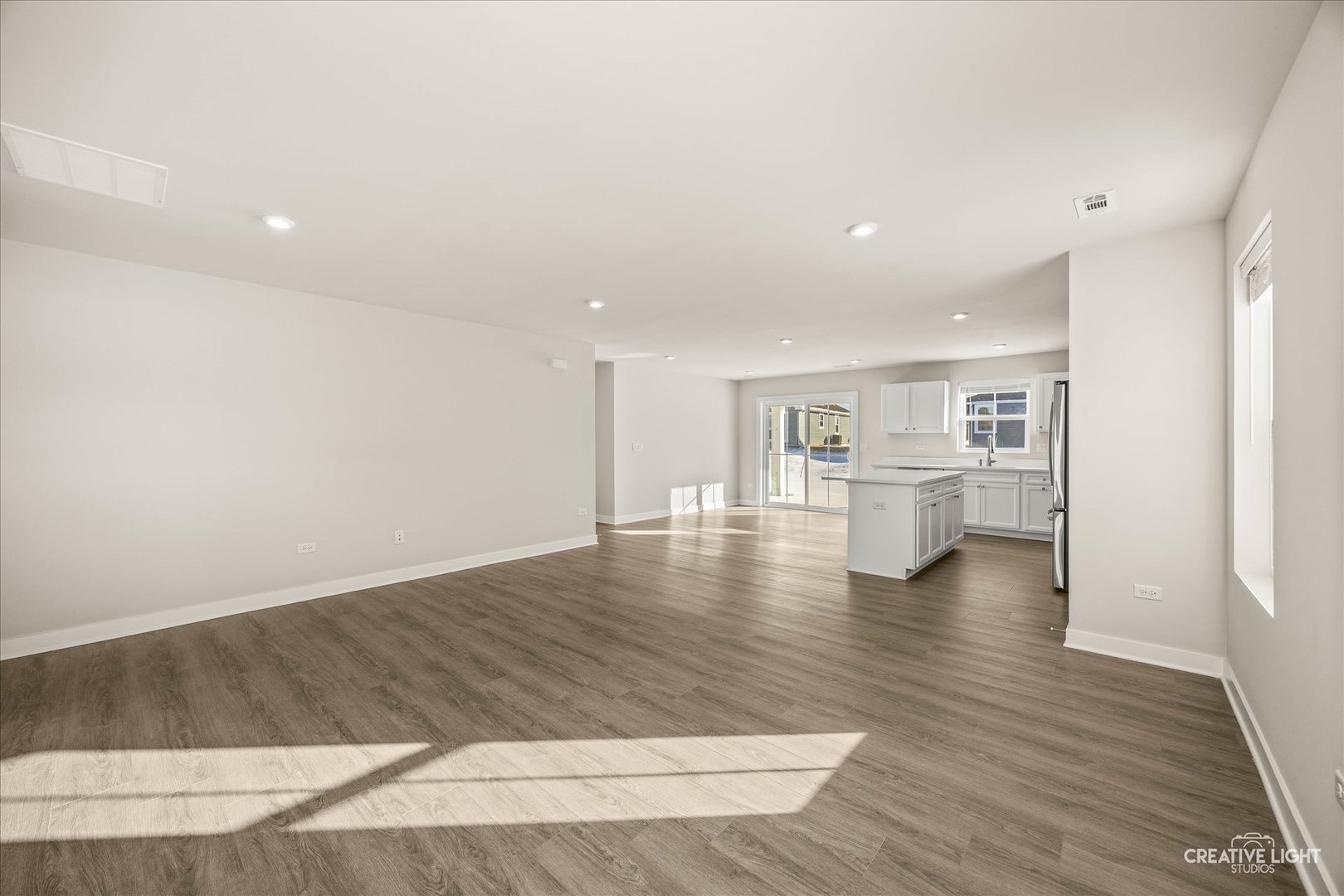 1237 Marigold Lane Hampshire, IL 60140 - Photo 13 of 34 a view of empty room with wooden floor