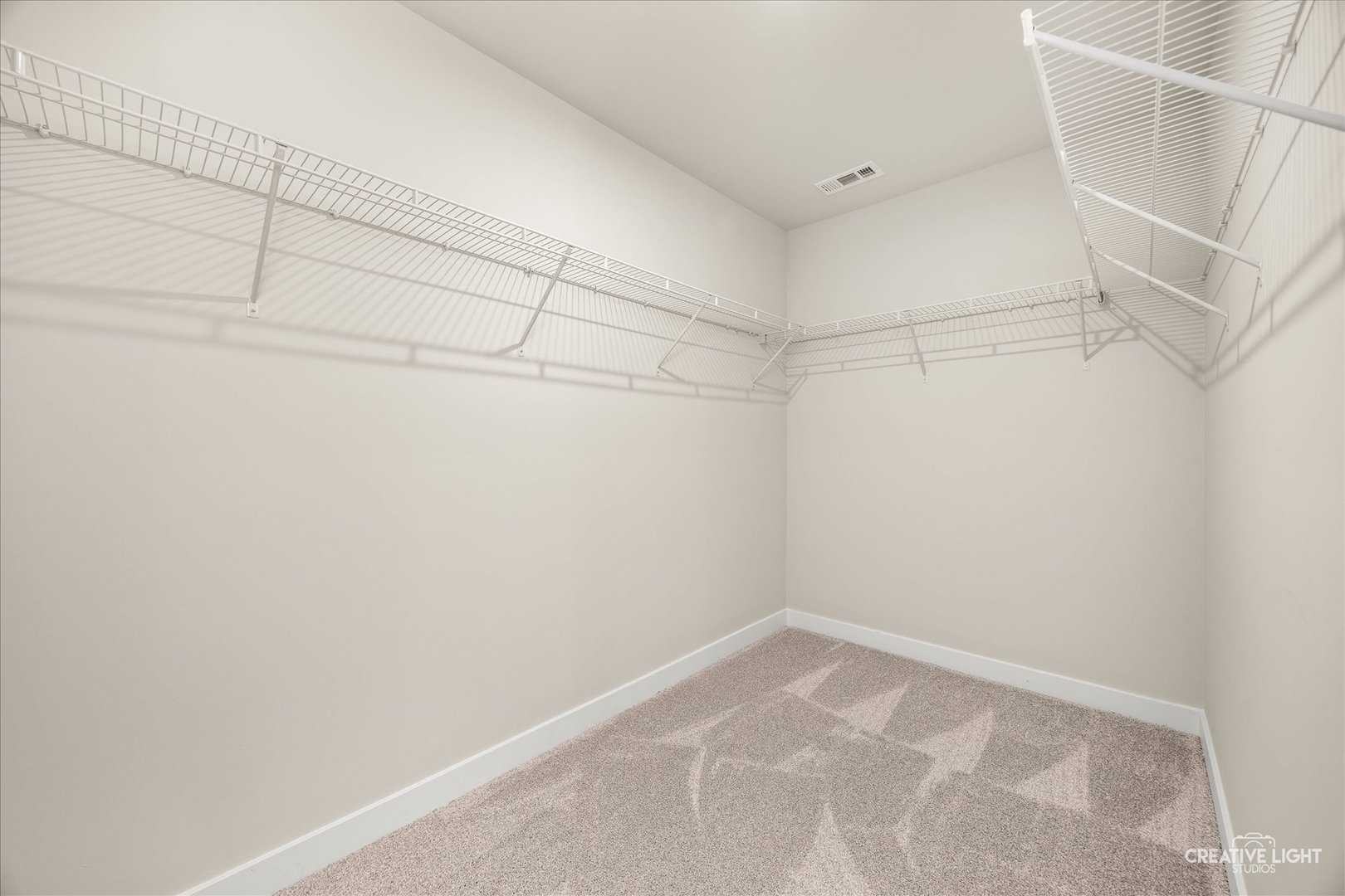 1237 Marigold Lane Hampshire, IL 60140 - Photo 23 of 34 a view of a room with racks on the wall