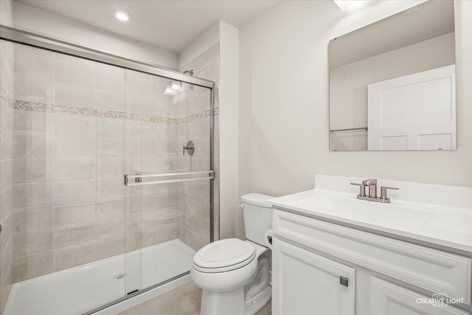 1237 Marigold Lane Hampshire, IL 60140 - Photo 25 of 34 a bathroom with a sink toilet and shower