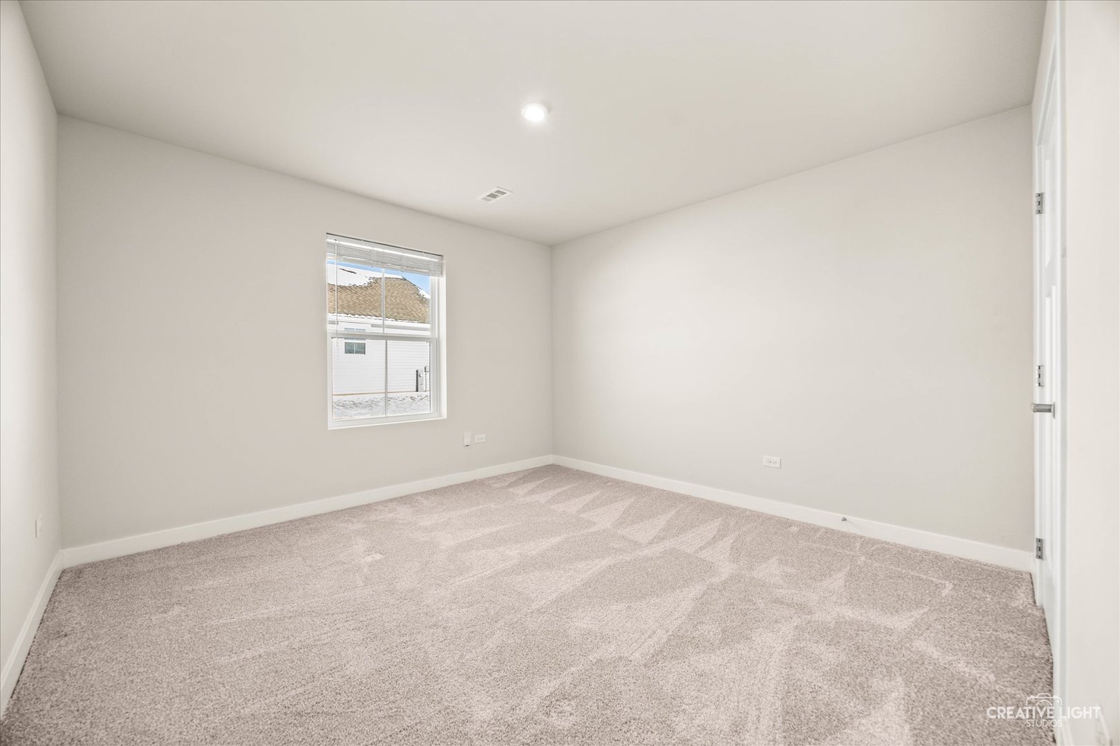 1237 Marigold Lane Hampshire, IL 60140 - Photo 26 of 34 an empty room with a window