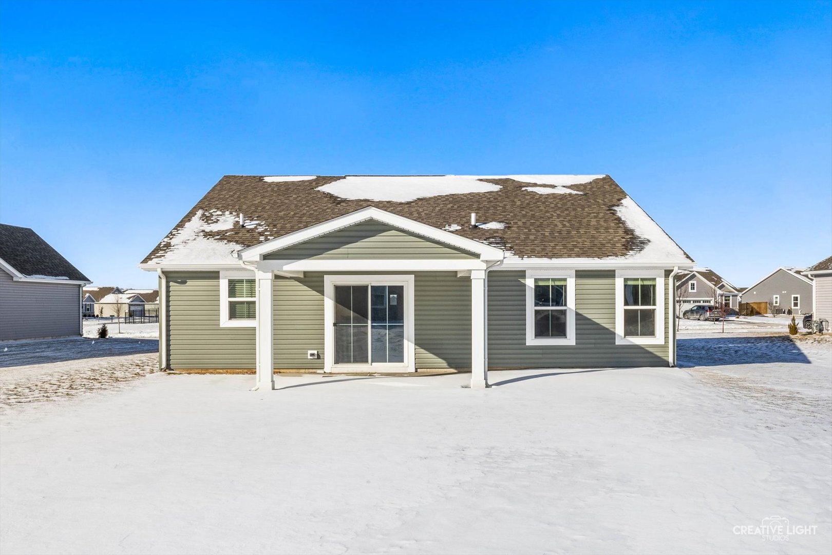 1237 Marigold Lane Hampshire, IL 60140 - Photo 29 of 34 a front view of a house with a garden