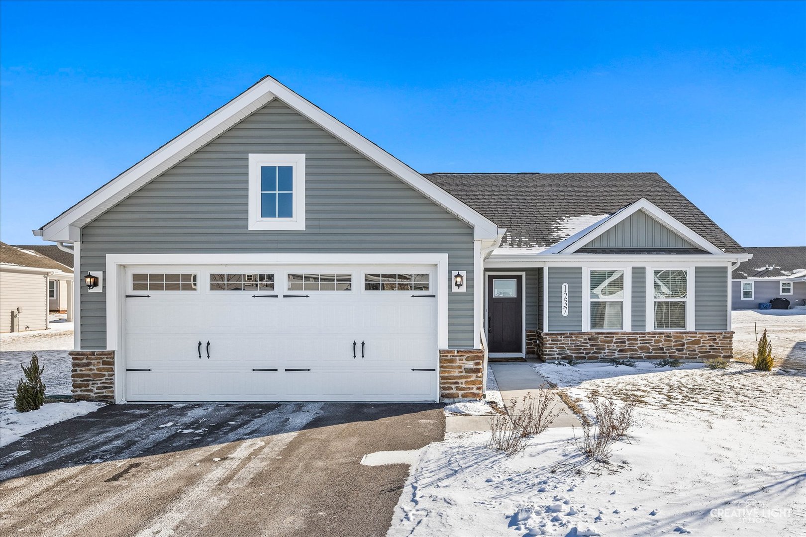 1237 Marigold Lane Hampshire, IL 60140 - Photo 4 of 34 a front view of a house with a yard