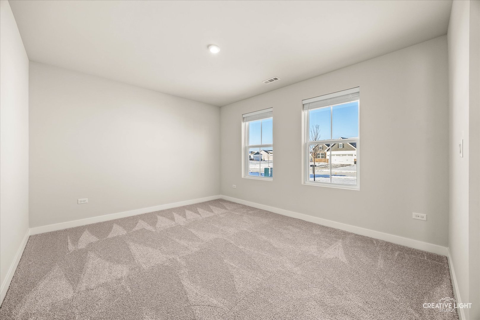1237 Marigold Lane Hampshire, IL 60140 - Photo 9 of 34 an empty room with windows