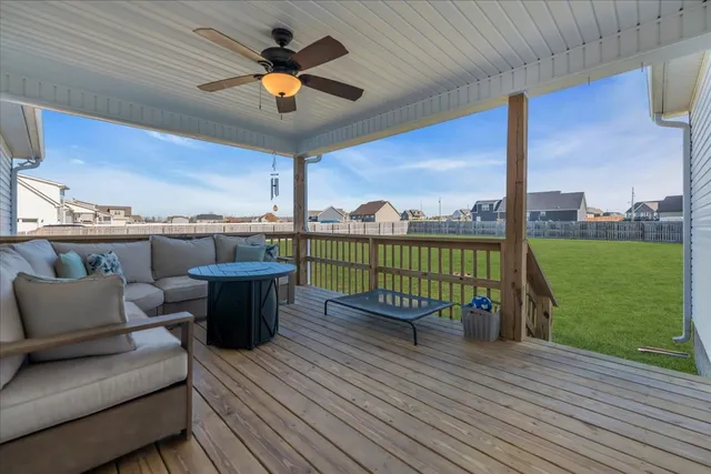 a view of a roof deck with couches