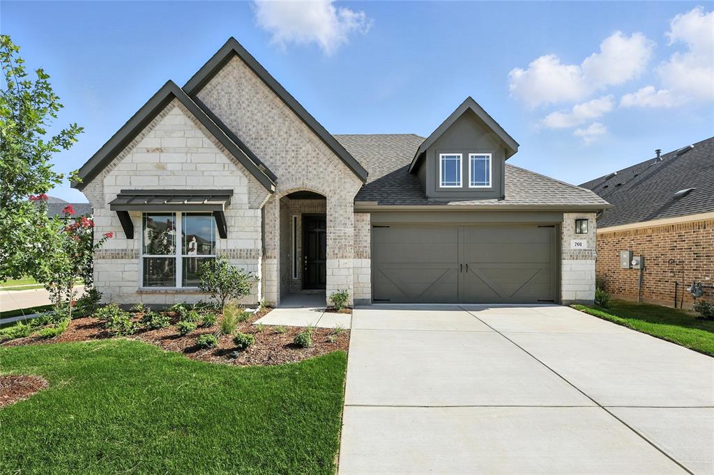 522 Orchard Place Van Alstyne, TX 75495 - Photo 1 of 1 a front view of a house with a yard and garage