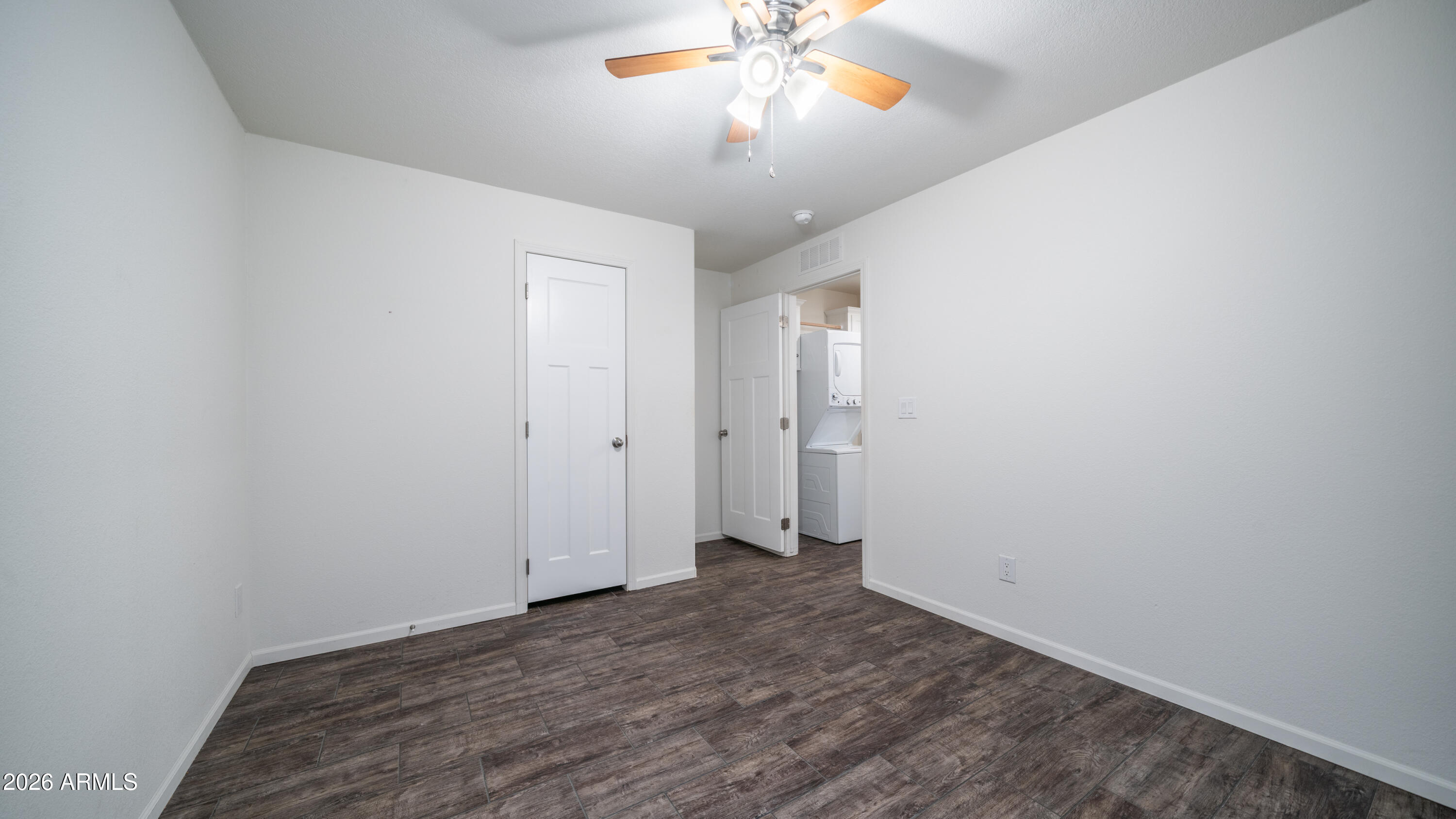 2929 East Main Street, Unit 237 Mesa, AZ 85213 - Photo 16 of 20 wooden floor in an empty room