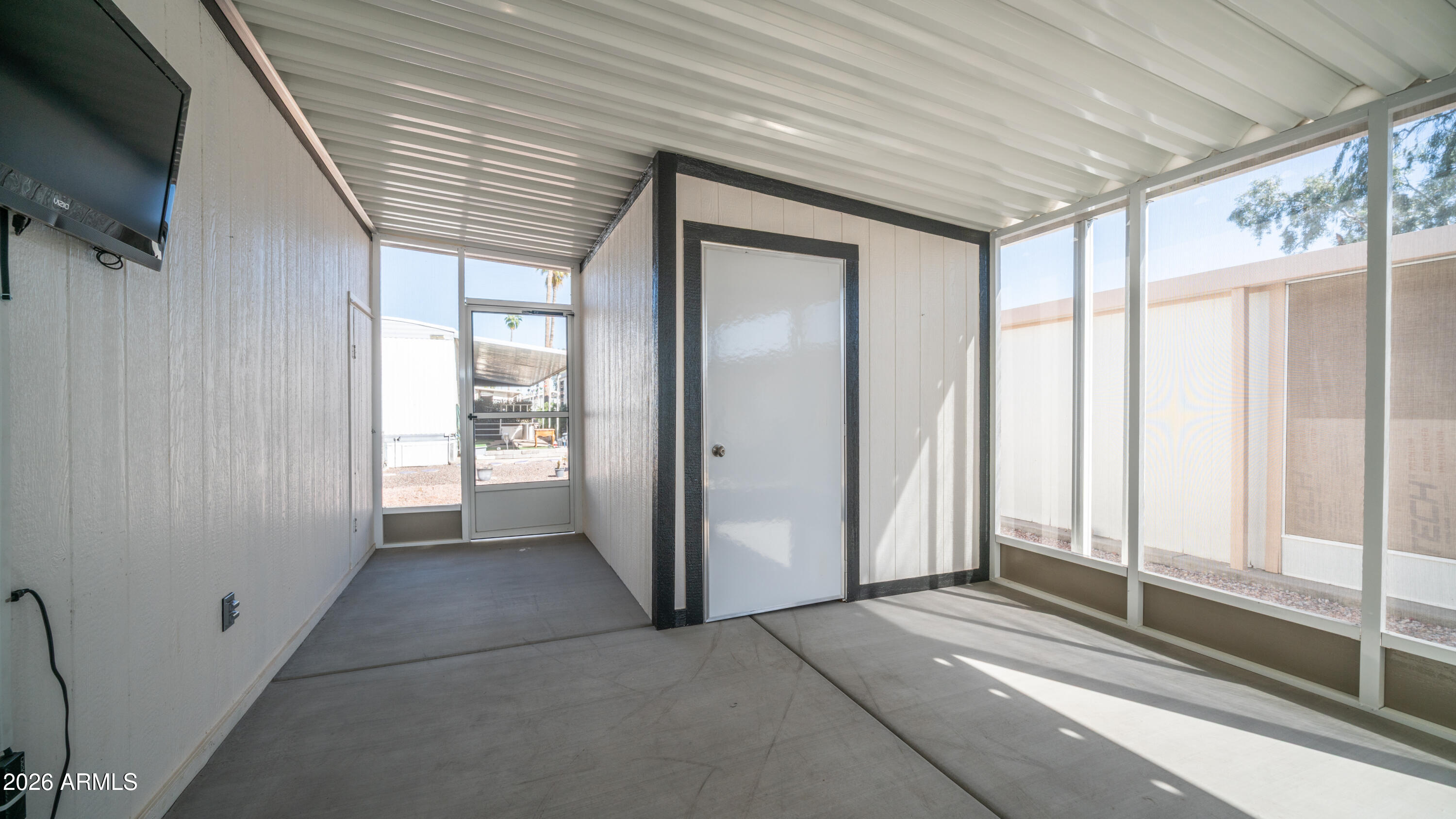 2929 East Main Street, Unit 237 Mesa, AZ 85213 - Photo 17 of 20 a view of a hallway with windows