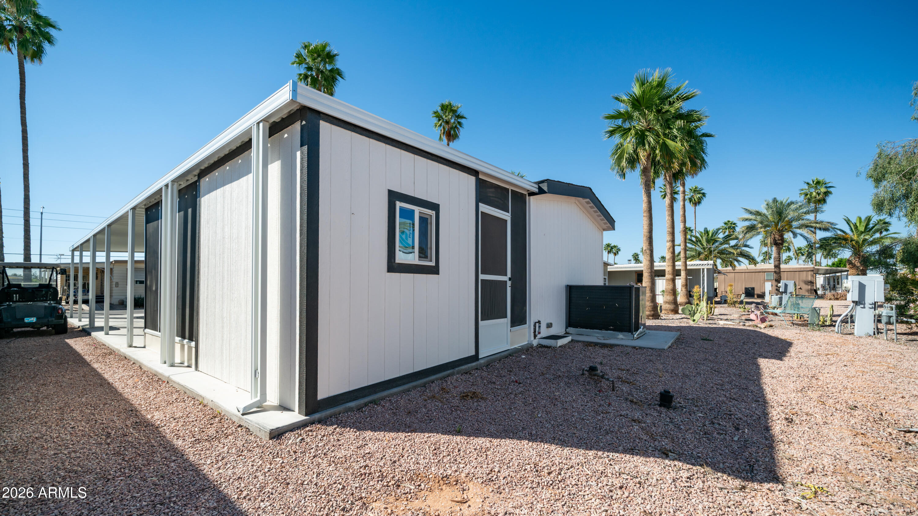 2929 East Main Street, Unit 237 Mesa, AZ 85213 - Photo 18 of 20 a view of a house with a patio