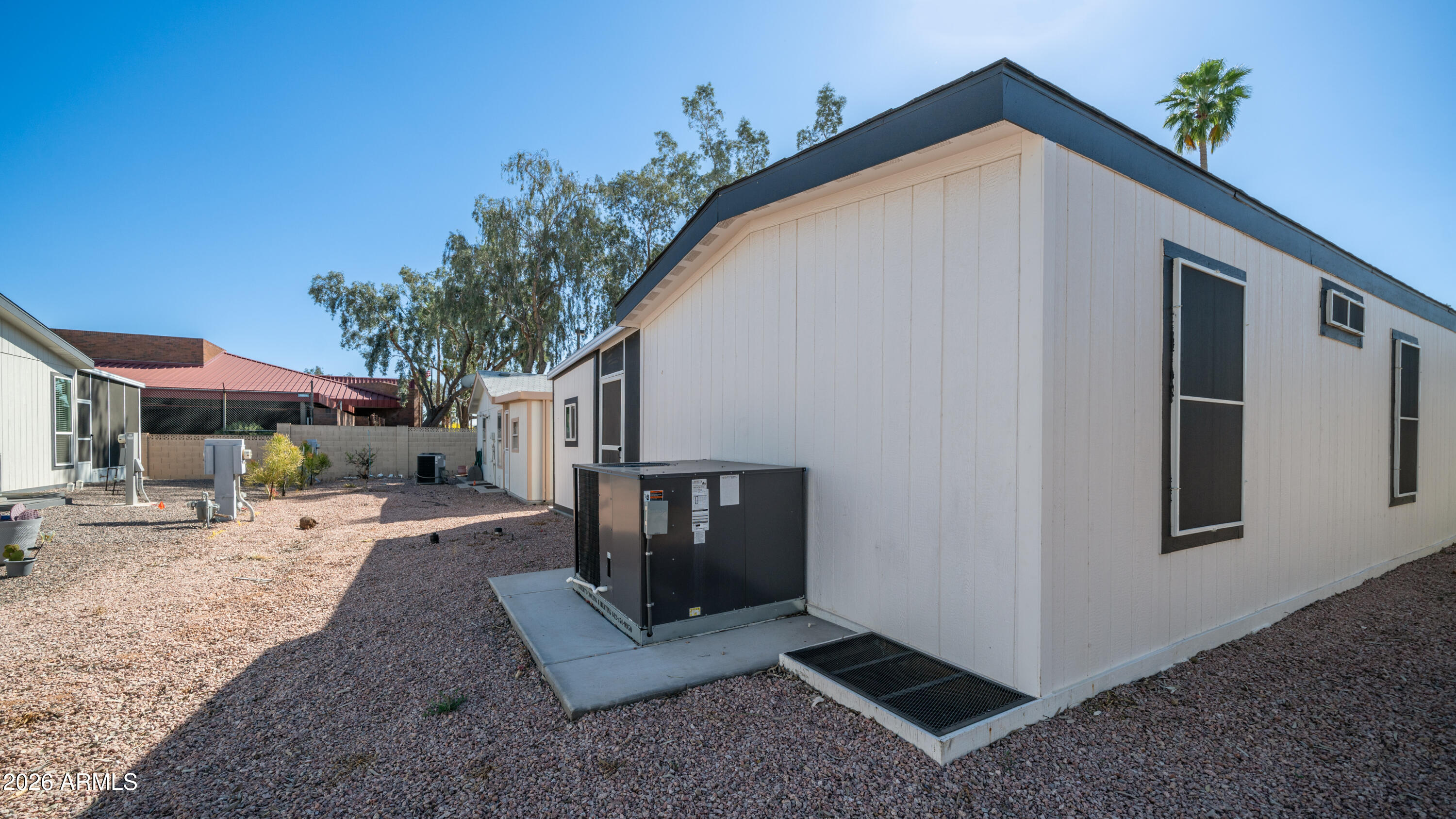 2929 East Main Street, Unit 237 Mesa, AZ 85213 - Photo 20 of 20 a view of a house with backyard