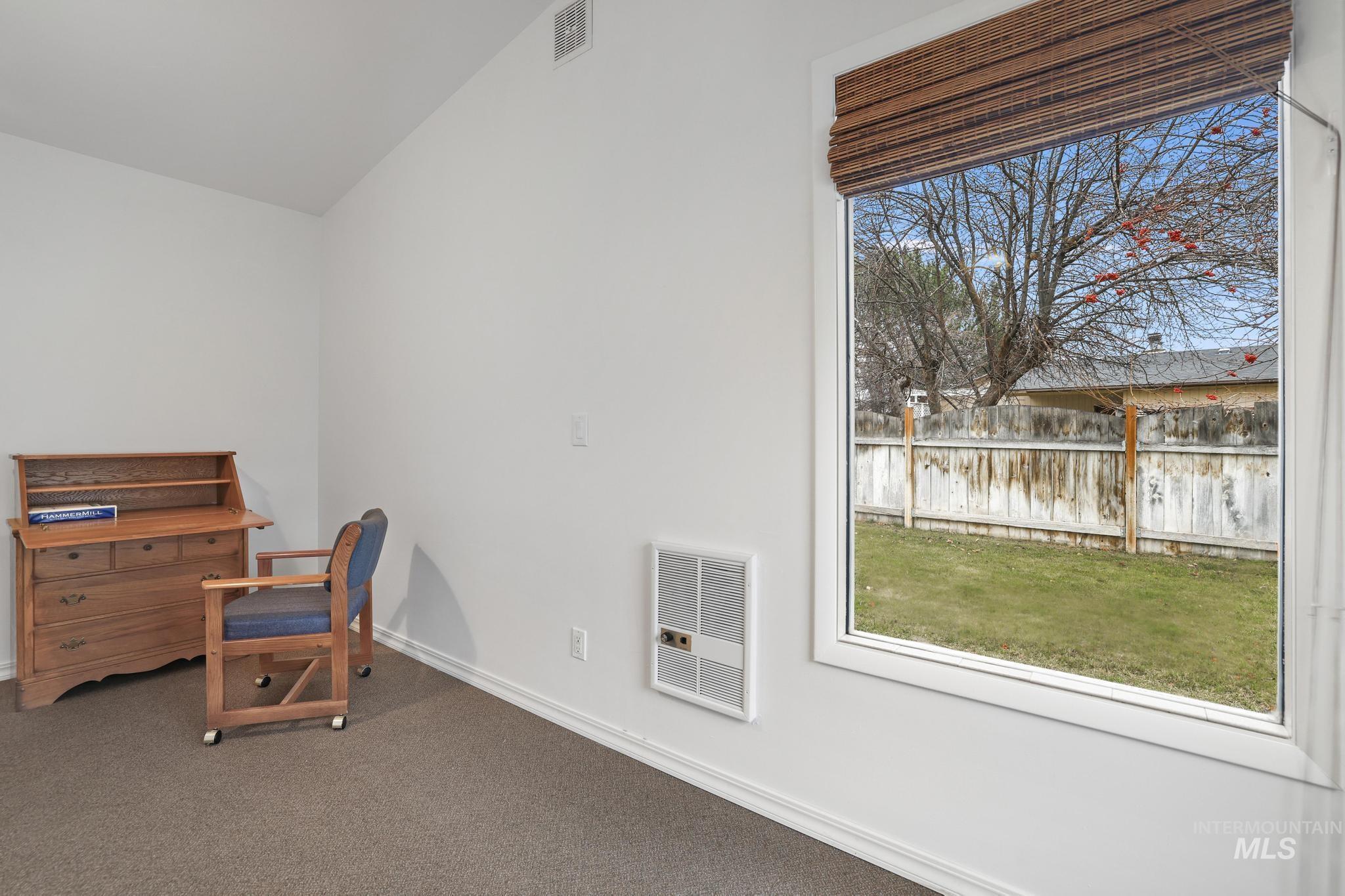 1143 Starfire Street Twin Falls, ID 83301 - Photo 19 of 32 Carpeted home office featuring heating unit and vaulted ceiling