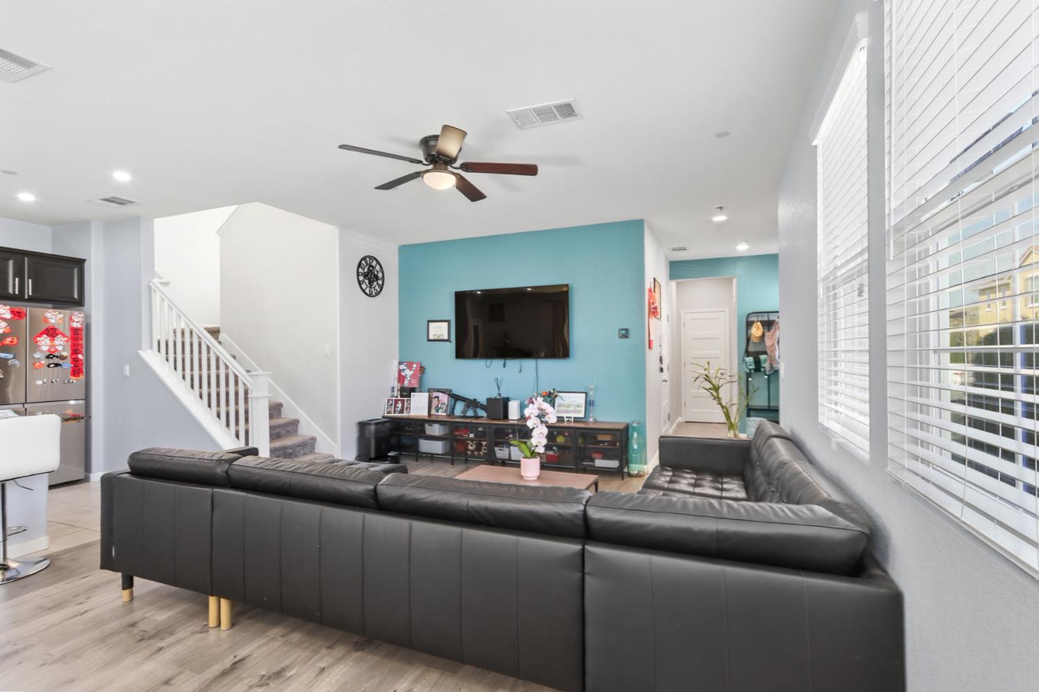 8196 Kramer Ranch Way Elk Grove, CA 95758 - Photo 11 of 47 a living room with furniture and a flat screen tv