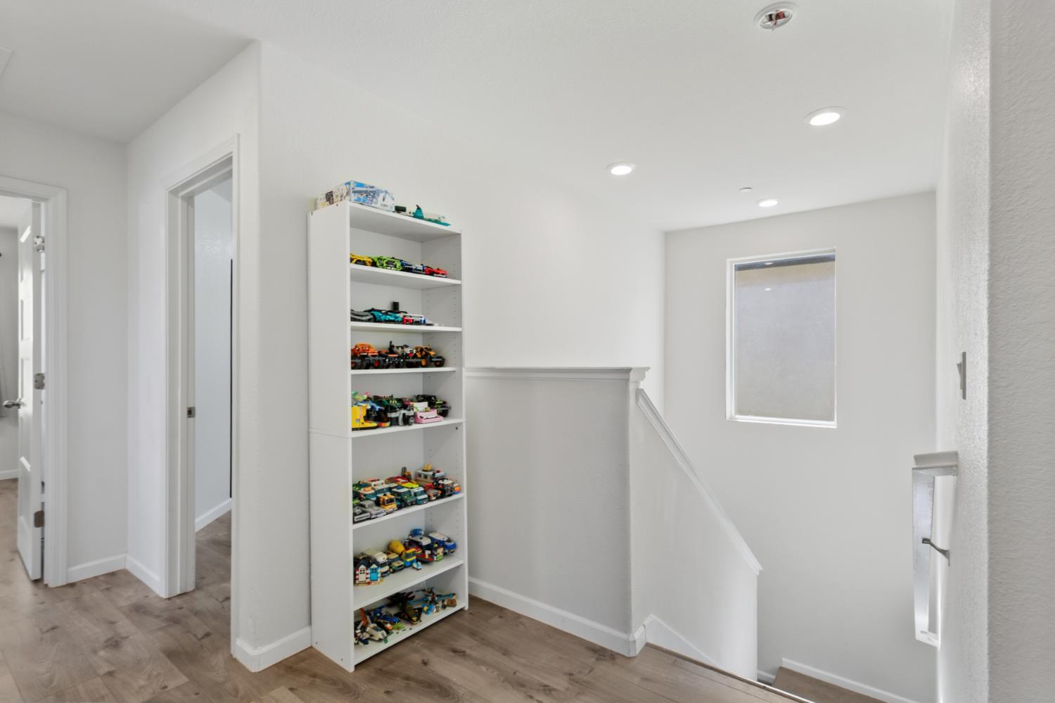 8196 Kramer Ranch Way Elk Grove, CA 95758 - Photo 20 of 47 a view of an empty room with shelves