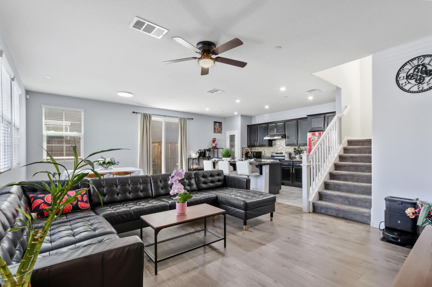 8196 Kramer Ranch Way Elk Grove, CA 95758 - Photo 8 of 47 a living room with furniture and wooden floor