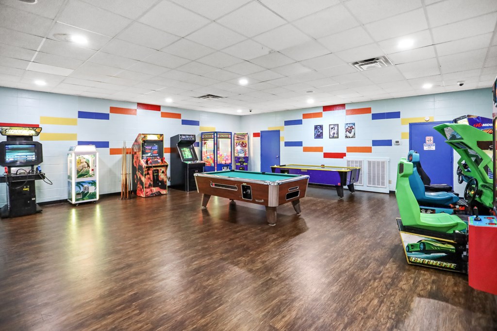 96 Holiday Court Ellijay, GA 30540 - Photo 50 of 51 a playing room with furniture and a wooden floor