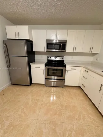 $225,000 | 10161 West Sunrise Boulevard, Unit 104, Plantation, FL 33322