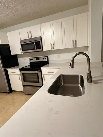 $225,000 | 10161 West Sunrise Boulevard, Unit 104, Plantation, FL 33322