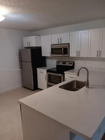 $225,000 | 10161 West Sunrise Boulevard, Unit 104, Plantation, FL 33322