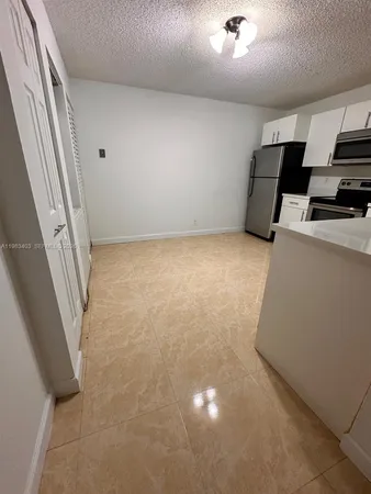 $225,000 | 10161 West Sunrise Boulevard, Unit 104, Plantation, FL 33322