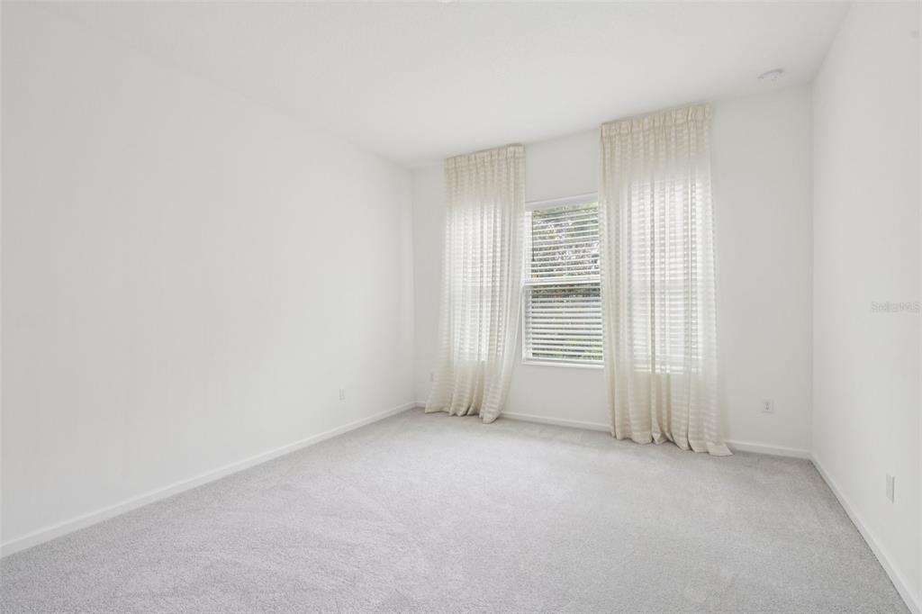 806 Winterside Drive Apollo Beach, FL 33572 - Photo 16 of 57 a view of an empty room with a window