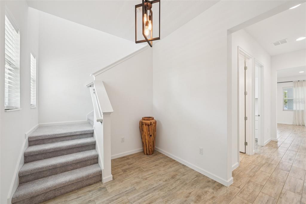 806 Winterside Drive Apollo Beach, FL 33572 - Photo 20 of 57 a view of front door with hallway and stairs