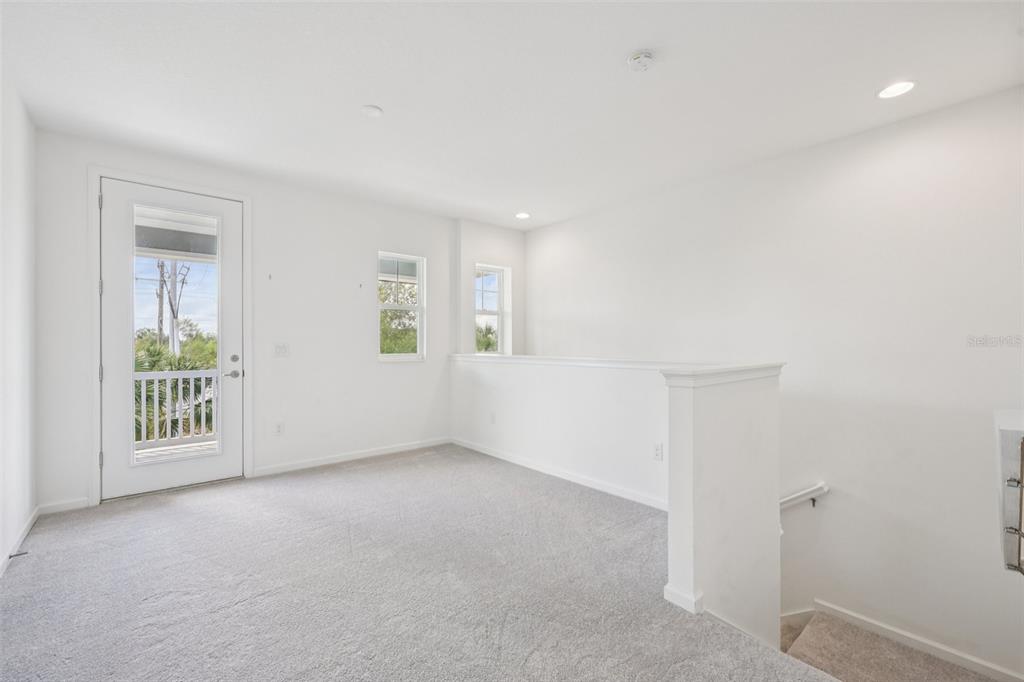 806 Winterside Drive Apollo Beach, FL 33572 - Photo 23 of 57 a view of an empty room with a window
