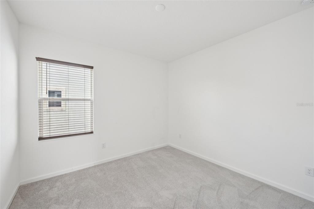 806 Winterside Drive Apollo Beach, FL 33572 - Photo 26 of 57 an empty room with a window