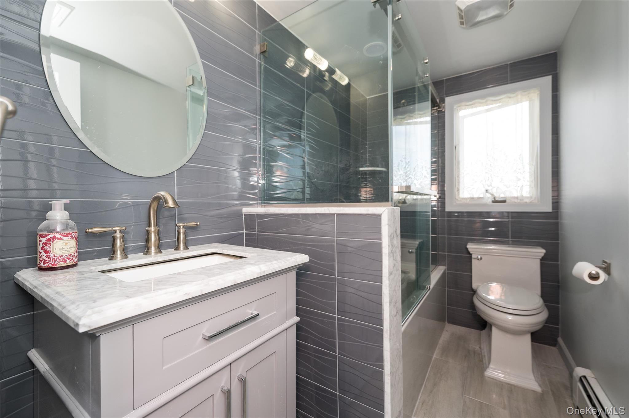 3414 Riverside Drive Oceanside, NY 11572 - Photo 12 of 25 Updated second floor bathroom