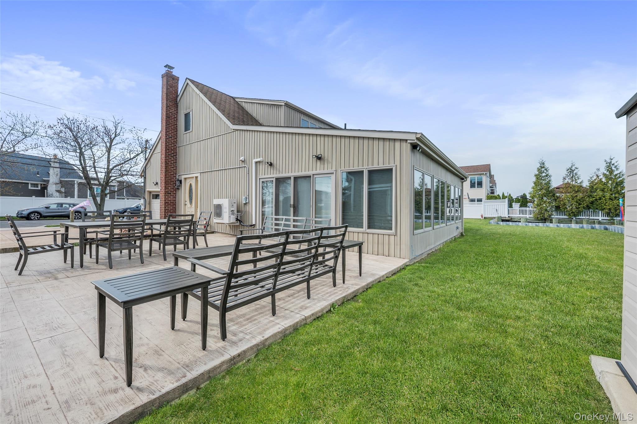 3414 Riverside Drive Oceanside, NY 11572 - Photo 16 of 25 Large paver patio