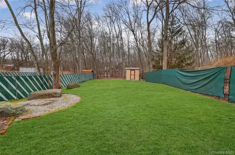 a garden view with a seating space